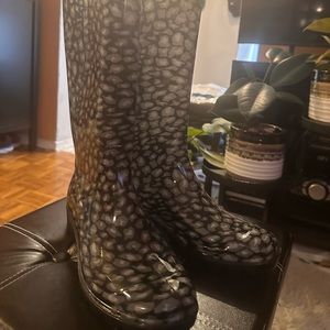 Black and white polkadot rain boots